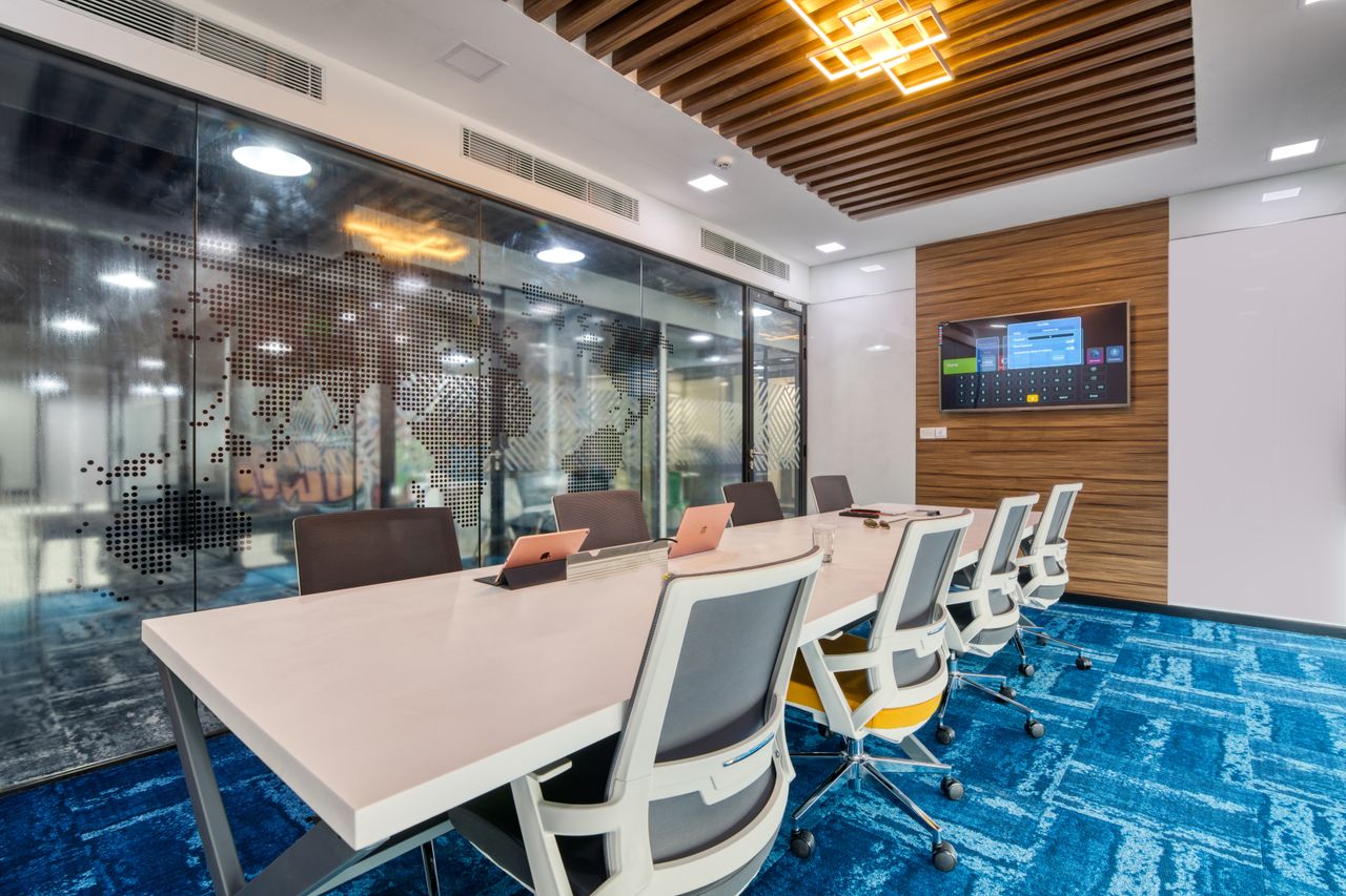 Mastering the First Impression: Your intriguing post title goes here Sleek, contemporary office boardroom with glass walls, modern furniture, and digital screen display.
